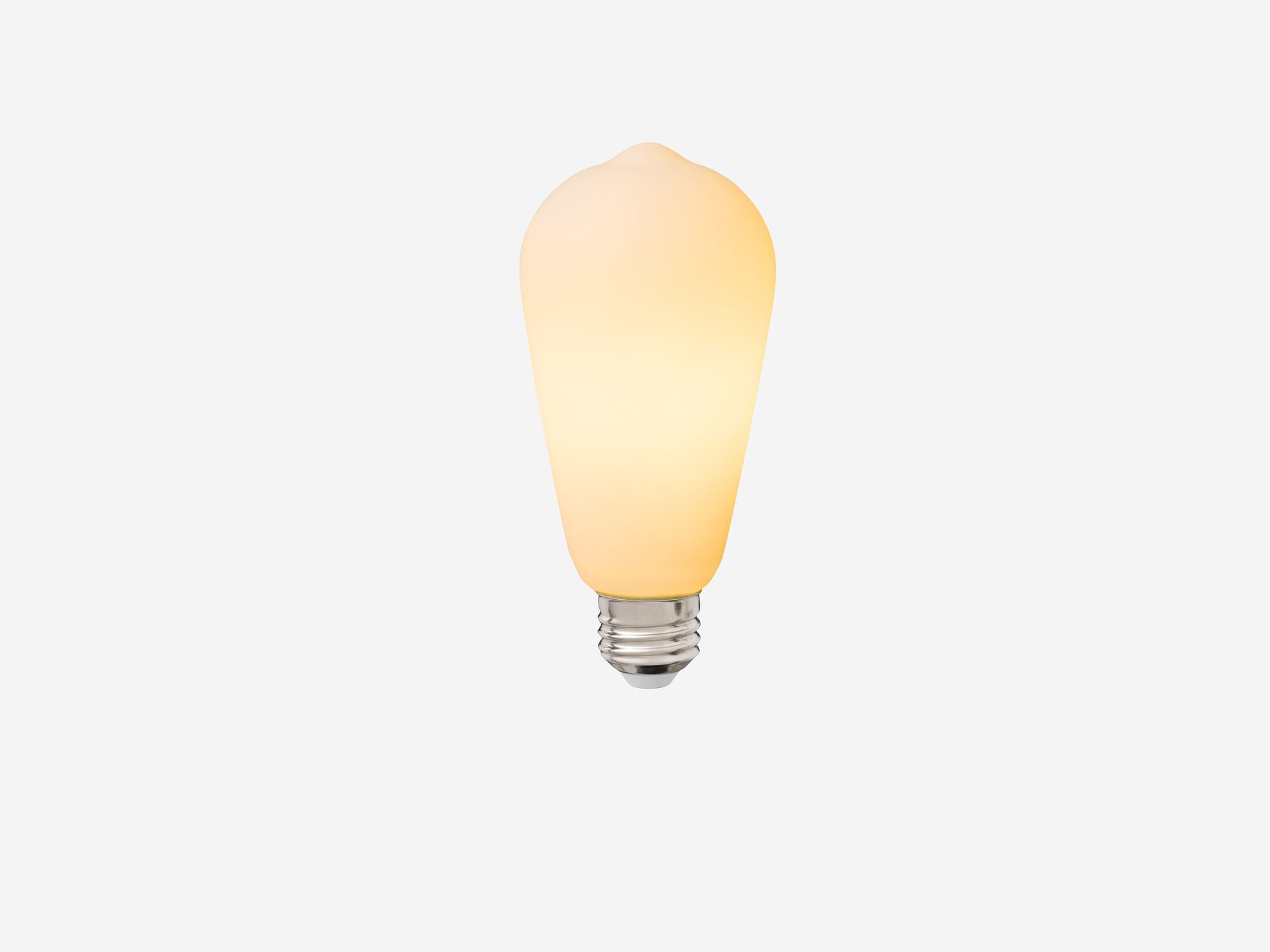 Medium matte white lightbulb with light on front view